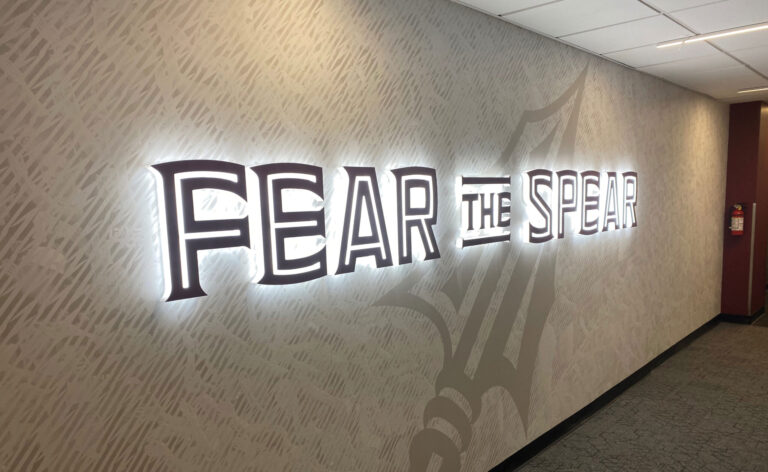 Interior Fear the Spear Lit Signage