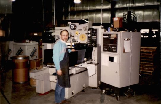 Man standing in front of a machine