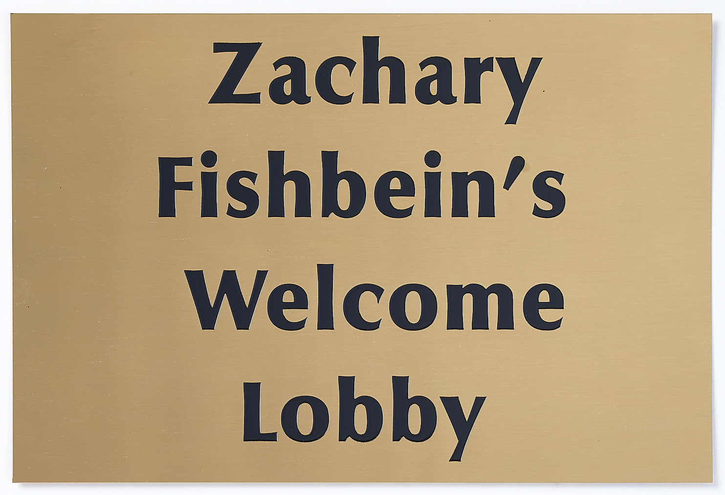 Brass office name plates and directional signage for commercial spaces.