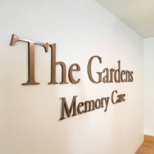 Precision Architectural Plaque and Flat Cut metal signage attached to interior walls. 